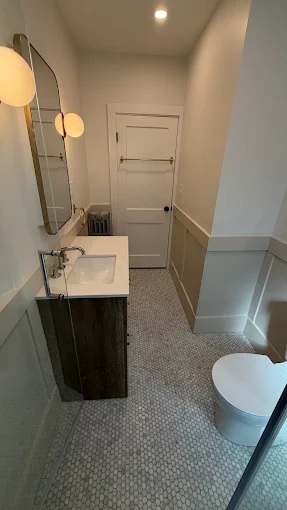 Classic Powder Room with Wainscoting