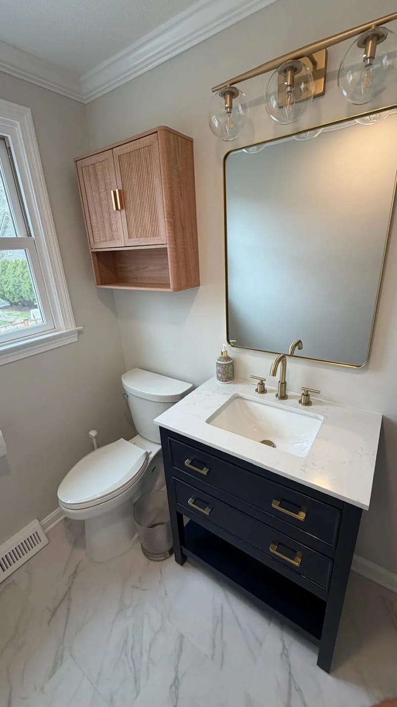 Powder Room with Navy & Gold Vanity